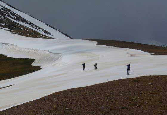 Surveying a mountain saddle
